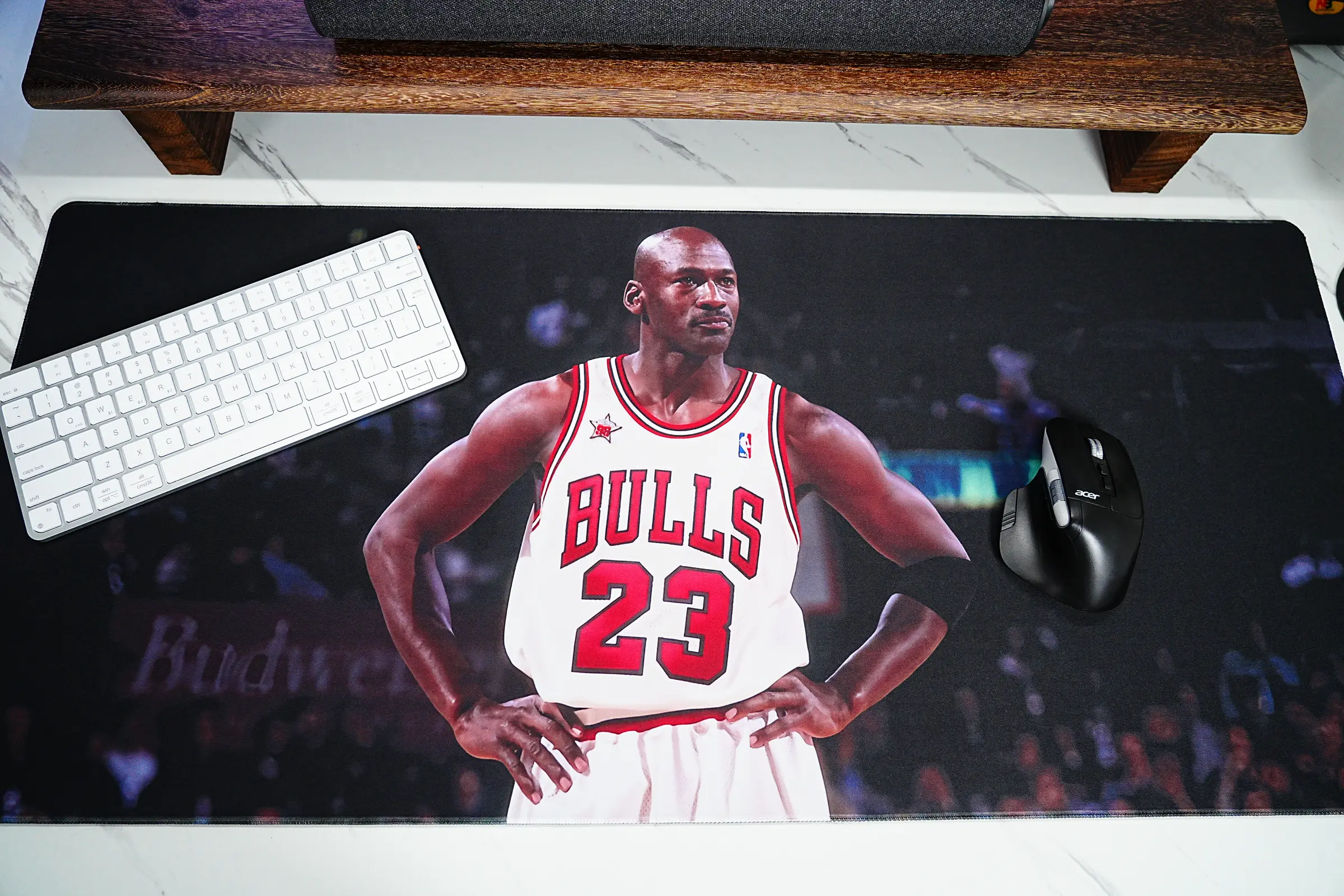 Basketball Mouse Pads shown in a Michael Jordan NBA desk setup with Bulls artwork, keyboard, mouse, and basketball fan style.