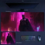 Batman Desk Mat with a neon city backdrop, armored vigilante stance, and glowing cyber noir atmosphere