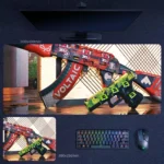 CS2 Weapon Skin Desk Mat featuring a bold red and green loadout combo with layered sticker graphics and competitive FPS styling