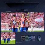 Julian Alvarez Atletico Madrid Desk Mat showing Alvarez celebrating in front of Atletico Madrid supporters during a home match