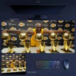 Kobe Bryant Mamba Mentality Mouse Pad showing Kobe with championship trophies in desk mat and mouse pad size display