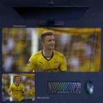 Marco Reus Dortmund Home Crowd Desk Mat with yellow-stand backdrop and calm match-day focus