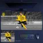 Marco Reus Dortmund Attacking Run Desk Mat with yellow-black burst art and forward-driving energy