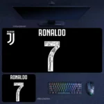 Cristiano Ronaldo Juventus desk mat with a bold number 7 graphic, Ronaldo name lettering, and Juventus-inspired black desk mat design