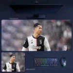 Cristiano Ronaldo Juventus desk mat featuring a focused in-game stadium portrait with a soft blurred crowd background and football-inspired layout