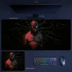 Spider-Man Desk Mat with symbiote split design, dark web background, and dual-form character contrast