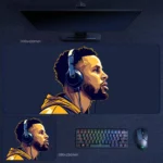 Stephen Curry locked-in mindset desk mat featuring Curry in headphones with calm focus and quiet intensity