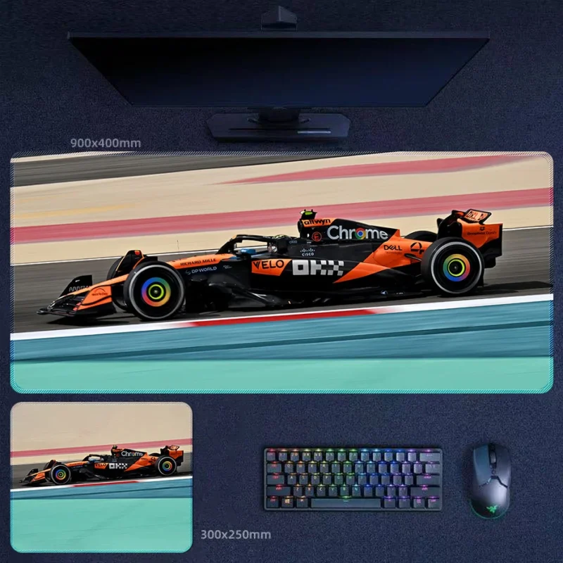Lando Norris 2025 McLaren Desk Mat Lando Norris 2025 McLaren desk mat with papaya F1 racing speed and side-profile track artwork