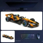 Lando Norris 2025 attack angle desk mat with McLaren F1 front three-quarter view, papaya black bodywork, and sharp nose-led racing design