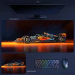 Lando Norris 2025 champion desk mat with McLaren papaya glow, dark garage backdrop, and title-winning F1 display style