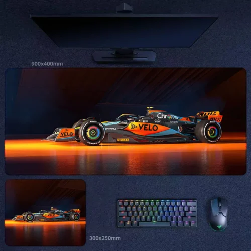 Lando Norris 2025 champion desk mat with McLaren papaya glow, dark garage backdrop, and title-winning F1 display style