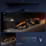 Lando Norris 2025 stealth mode desk mat with black and papaya McLaren F1 artwork, sharp front angle, and championship-era attitude
