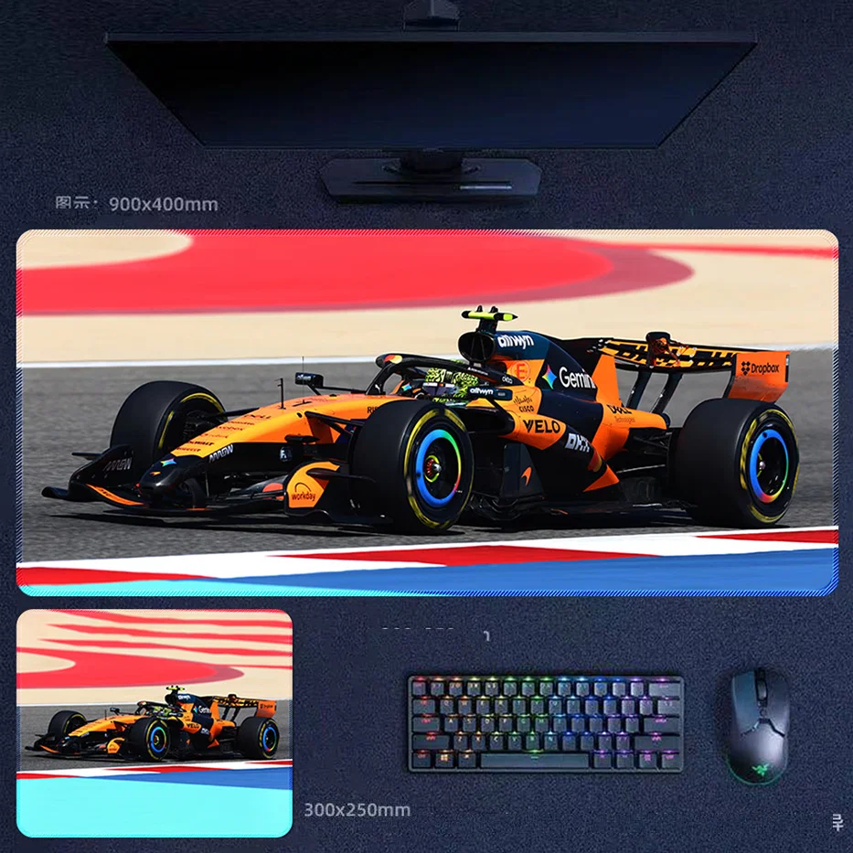 Lando Norris 2025 apex corner desk mat with McLaren F1 race car artwork, sharp cornering angle, and grand prix track action