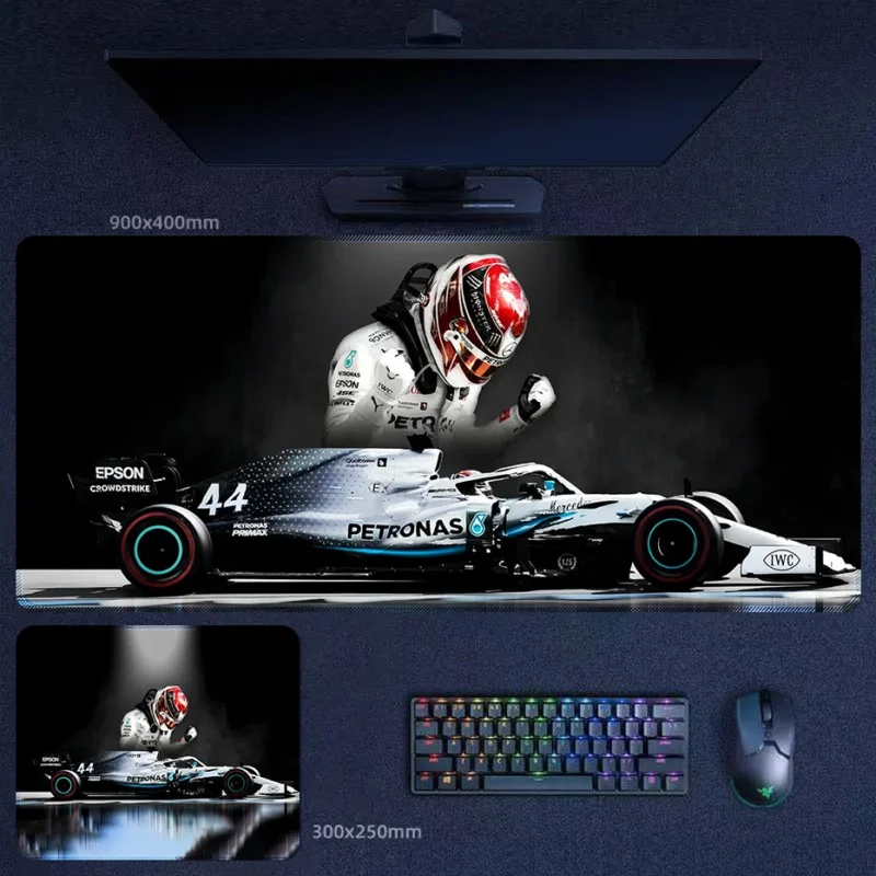 Lewis Hamilton Mercedes No. 44 Desk Mat for Racing Fans Lewis Hamilton Mercedes No. 44 Desk Mat featuring Hamilton and the Mercedes race car in a bold side-profile racing composition