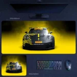 Porsche 911 GT3 desk mat with black yellow motorsport styling and centered race-car composition
