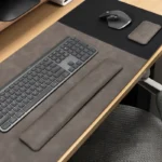 Taupe leather desk pad and wrist rest set with a muted office color palette for a softer and more understated workspace style