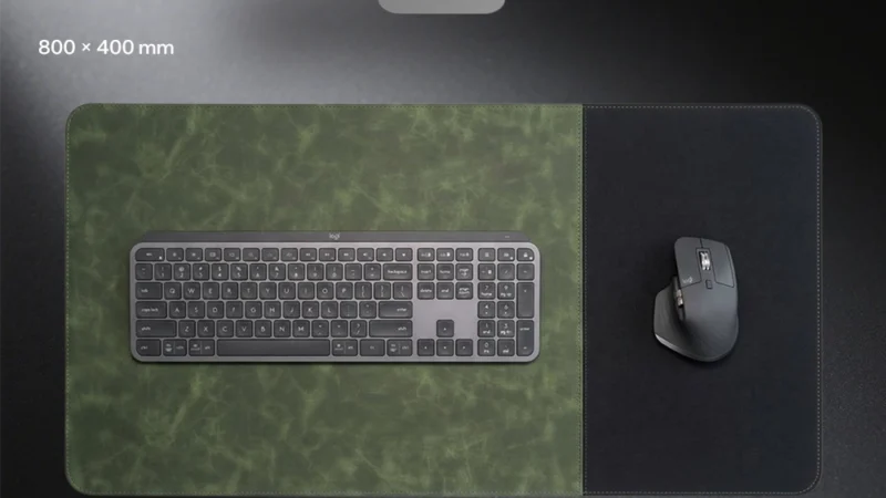 Premium Executive Leather Desk Mat in a top view with a leather keyboard section, fabric mouse area, stitched edges, and full desk coverage