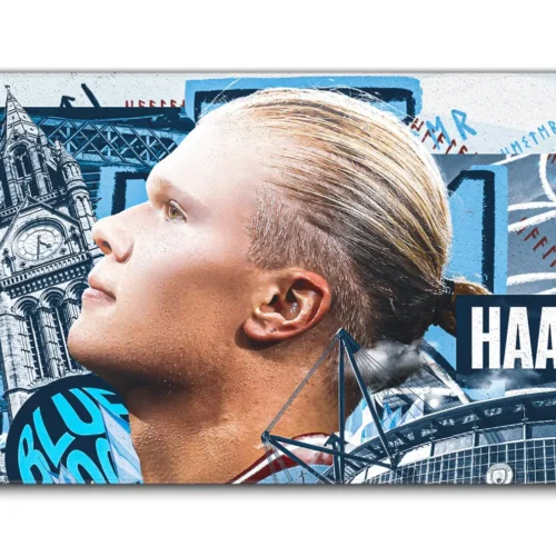 Haaland Man City Welcome Desk Mat in 900 x 400 mm with signing-poster artwork, Manchester landmarks, and Etihad Stadium details.
