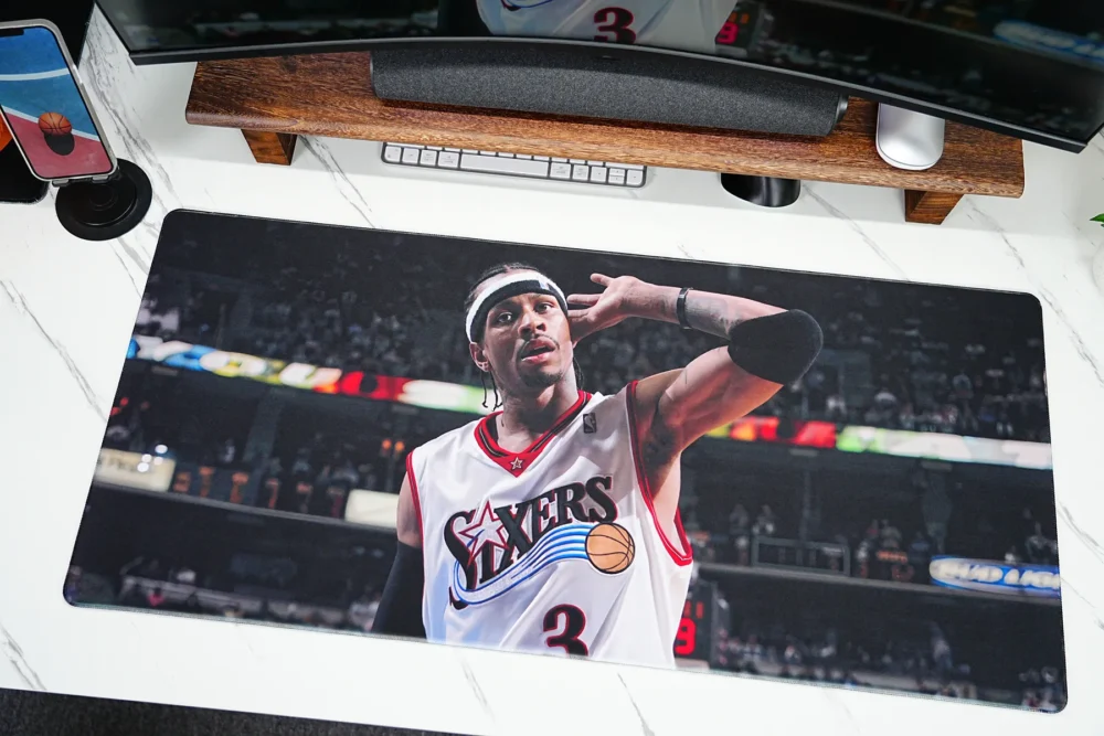 Allen Iverson basketball desk mat laid flat on a white desktop, showing vivid color reproduction, clear print detail, and wide mat coverage