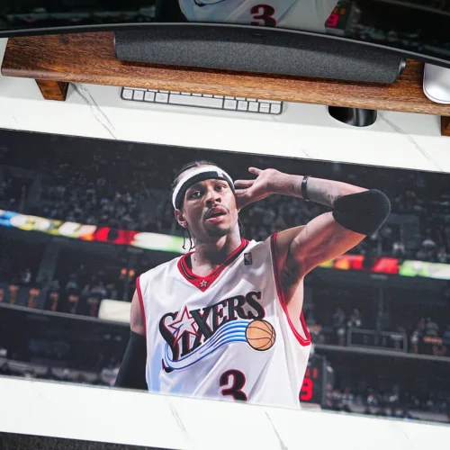 Allen Iverson basketball desk mat laid flat on a white desktop, showing vivid color reproduction, clear print detail, and wide mat coverage