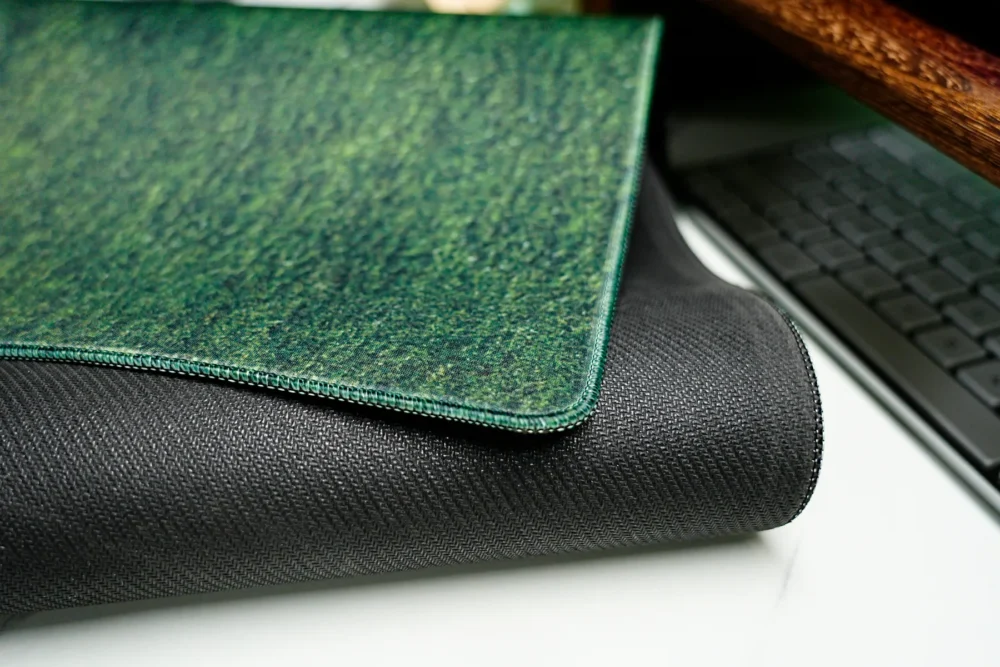 Ronaldo Mouse Pad with Stitched Edge and Rubber Base Close-up of Ronaldo mouse pad stitched edge and textured rubber base designed to reduce fraying, curling, and unwanted desk movement