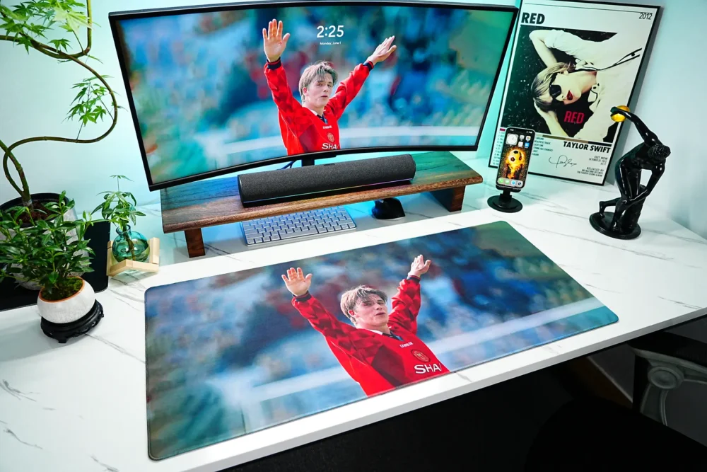 David Beckham tribute desk mat shown in a full desktop setup, with a large surface that visually connects the monitor, keyboard, and mouse into one coordinated workspace