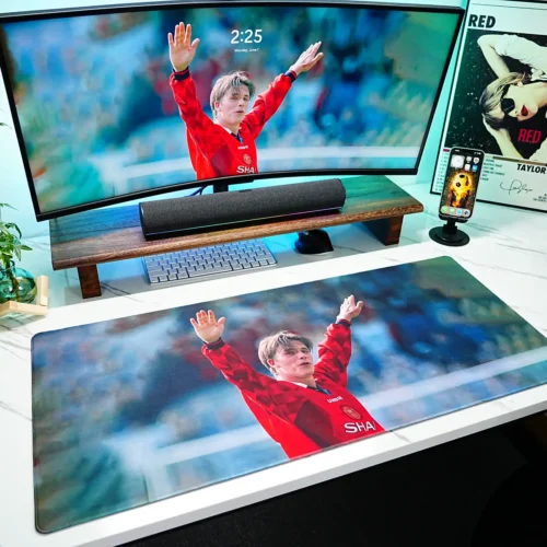 David Beckham tribute desk mat shown in a full desktop setup, with a large surface that visually connects the monitor, keyboard, and mouse into one coordinated workspace