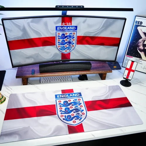 England World Cup Football Desk Mat shown with matching screen wallpaper, trophy decor, and football desk accessories for a unified fan setup
