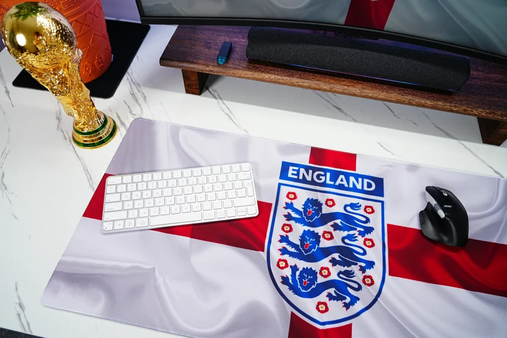 England football desk mat with keyboard and mouse placed on top to show balanced typing space and smooth mouse movement area