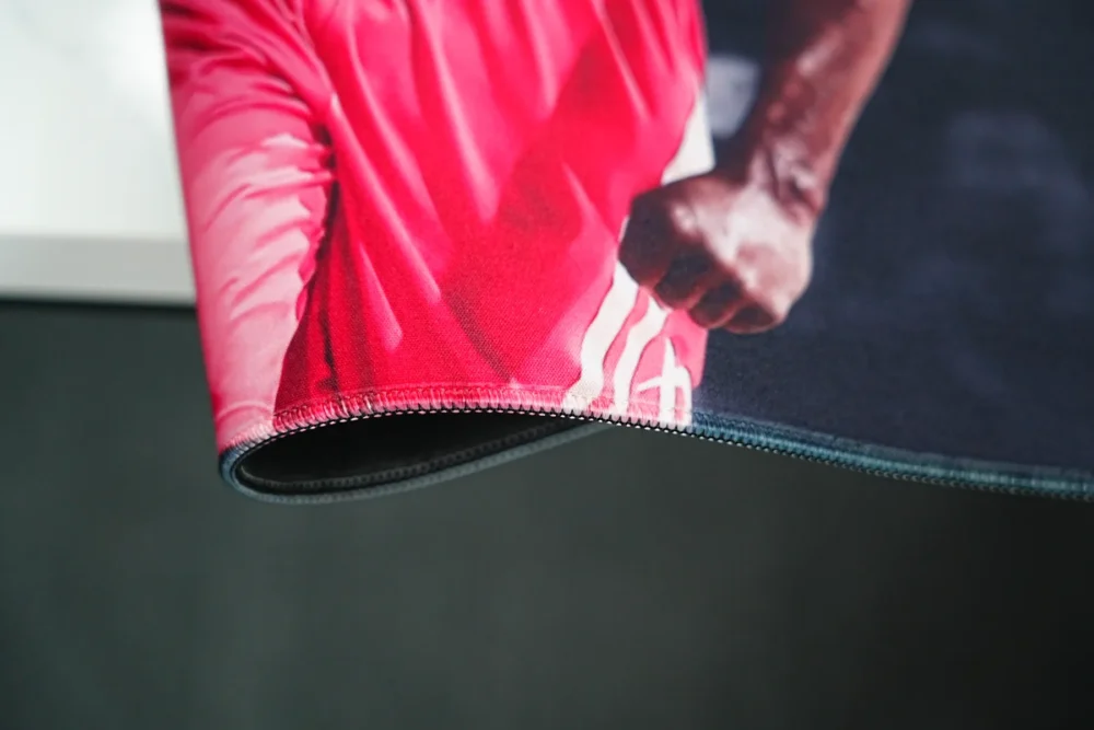 James Harden Desk Mat Stitched Edge Detail Folded James Harden desk mat edge shows stitched borders and flexible rubber layers that reduce fraying and edge splitting