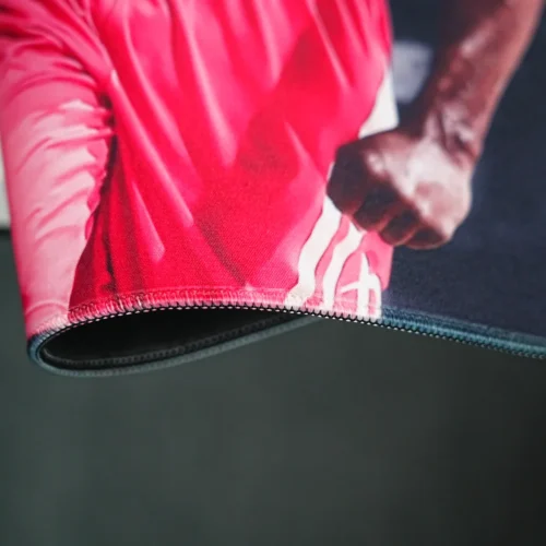 James Harden Desk Mat Stitched Edge Detail Folded James Harden desk mat edge shows stitched borders and flexible rubber layers that reduce fraying and edge splitting