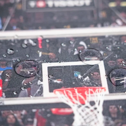Spill resistant Kevin Durant basketball desk mat surface with water beads staying on the printed Finals court artwork