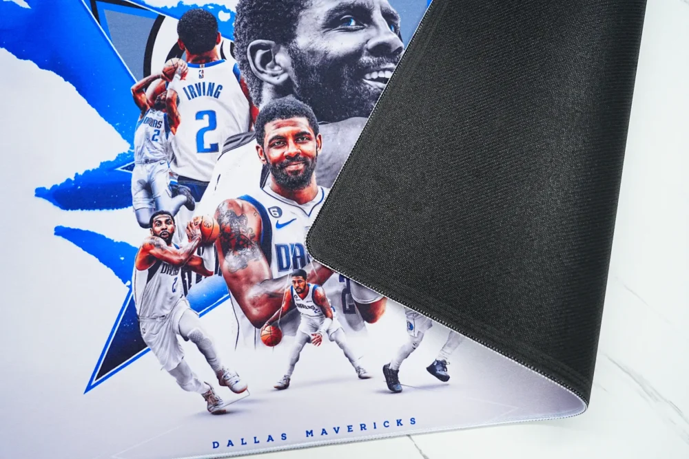 Anti-Slip Rubber Base Basketball Desk Mat Basketball desk mat lifted to show the black anti-slip rubber base, helping the mat stay steady during fast mouse movement