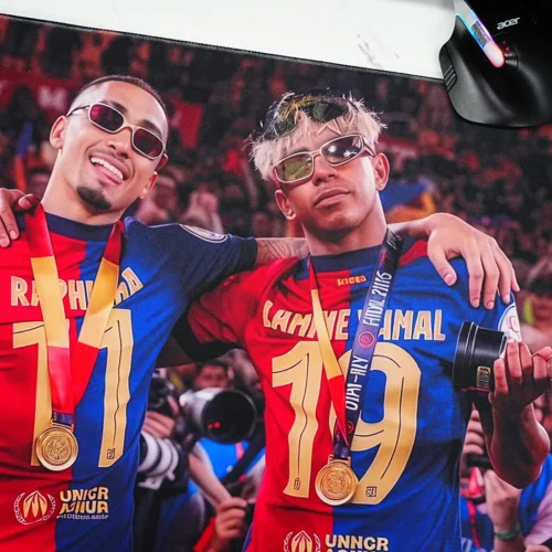 Lamine Yamal Barcelona Mouse Pad featuring Yamal and his Barcelona teammate with medals and trophy details in a close celebration view