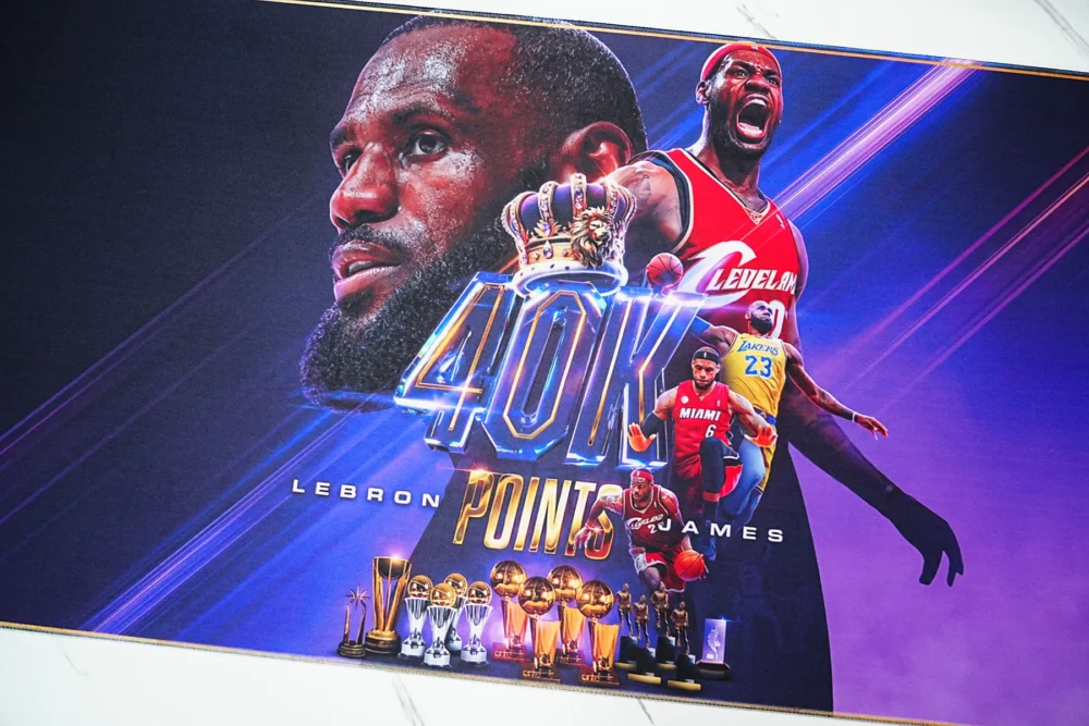 LeBron 40K Artwork Detail Desk Mat LeBron 40K desk mat close-up showing sharp artwork, vivid color, crown detail, trophies, and career tribute elements