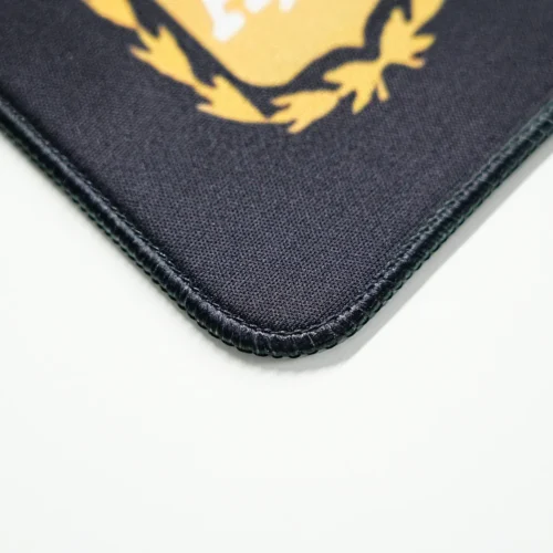 Messi Mouse Pad Stitched Edge Detail Close-up of stitched edge and rounded corner on Messi mouse pad designed to reduce fraying and fabric separation
