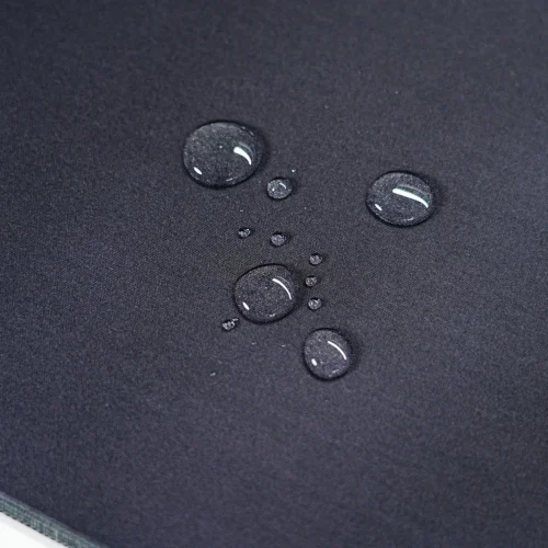 Messi Mouse Pad Spill-Resistant Cloth Surface Water drops resting on the Messi mouse pad cloth surface, showing spill resistance for easier daily desk protection