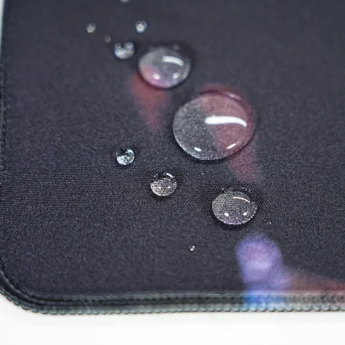 Jordan Bulls Spill Resistant Desk Mat Surface Water beads on the Jordan Bulls desk mat surface show spill-resistant fabric that protects daily use
