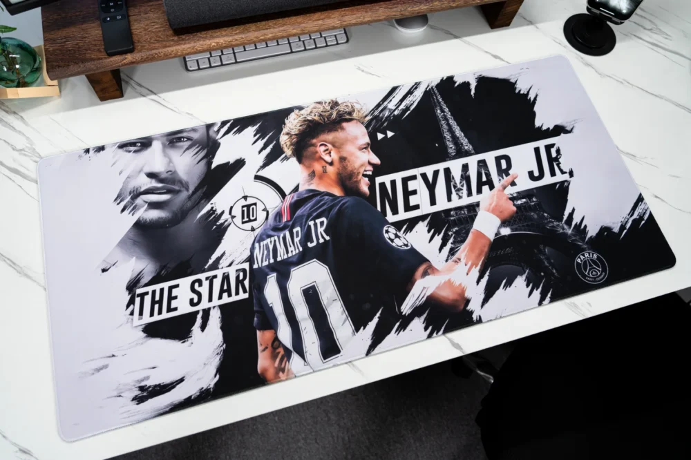 Neymar Jr Soccer Tribute Mouse Pad photographed from above to reveal the full artwork layout, including Neymar imagery, No. 10 detail, and Paris-inspired elements