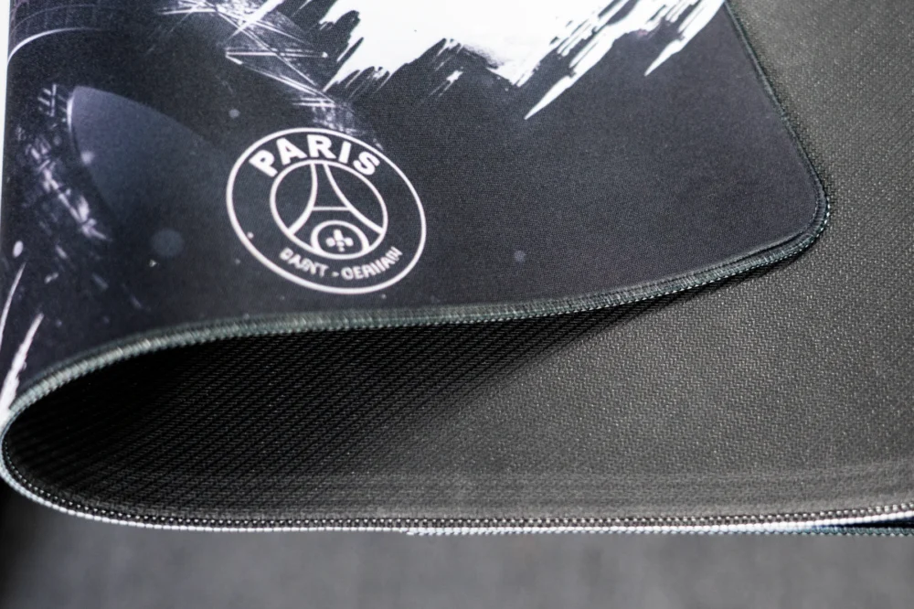 Neymar Jr Soccer Tribute Mouse Pad close-up of the stitched edge and rubber base, showing the layered construction and flexible desk mat build