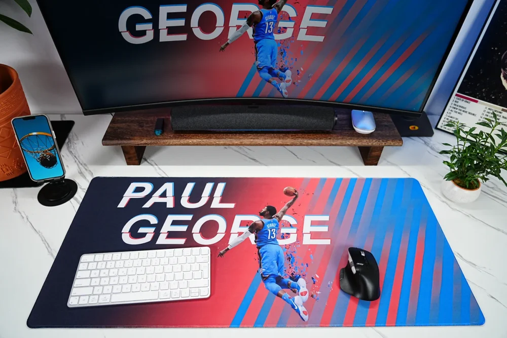 Paul George desk mat with keyboard and mouse placed on one surface for a cleaner gaming and work setup
