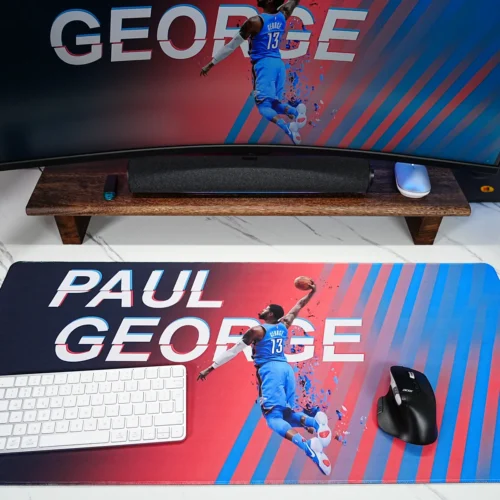 Paul George desk mat with keyboard and mouse placed on one surface for a cleaner gaming and work setup