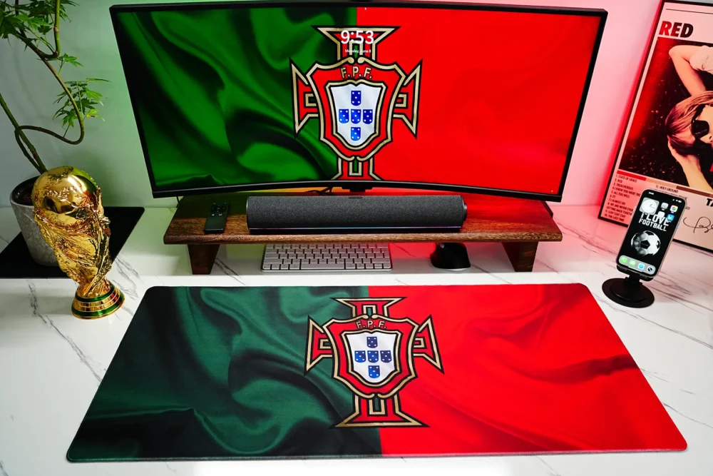 Red green Portugal football desk mat aligned with monitor lighting to make the desktop look coordinated for fans