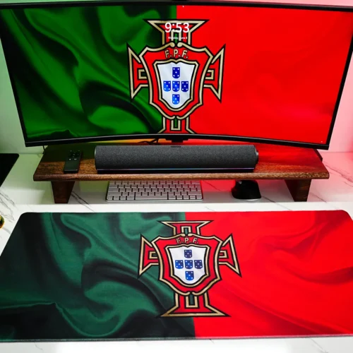 Red green Portugal football desk mat aligned with monitor lighting to make the desktop look coordinated for fans