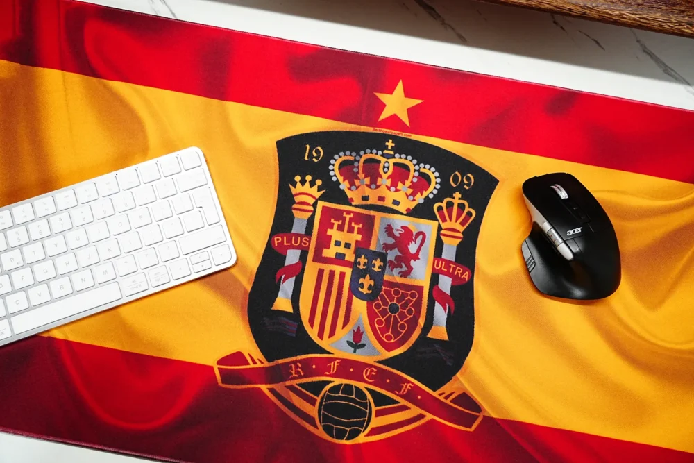 Spain soccer desk mat with keyboard and mouse in use, showing clear mouse space and visible center artwork for daily control.