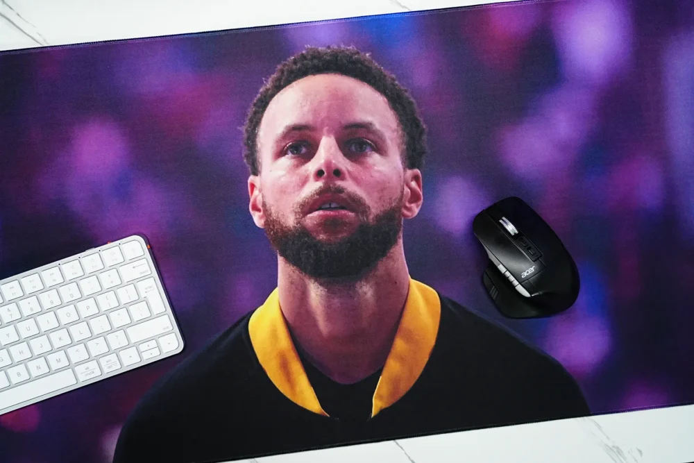 Stephen Curry Desk Mat for Keyboard and Mouse Stephen Curry desk mat used with keyboard and mouse on a clean desktop