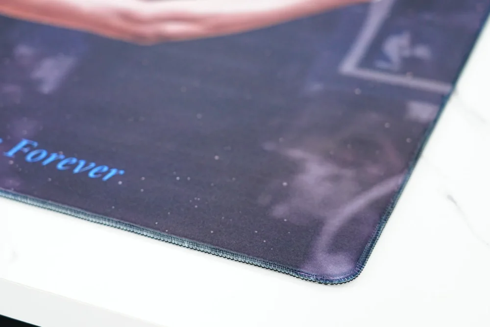 Close-up of basketball gaming mouse pad with rounded stitched edges that help reduce fraying and fabric peeling