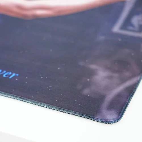 Close-up of basketball gaming mouse pad with rounded stitched edges that help reduce fraying and fabric peeling