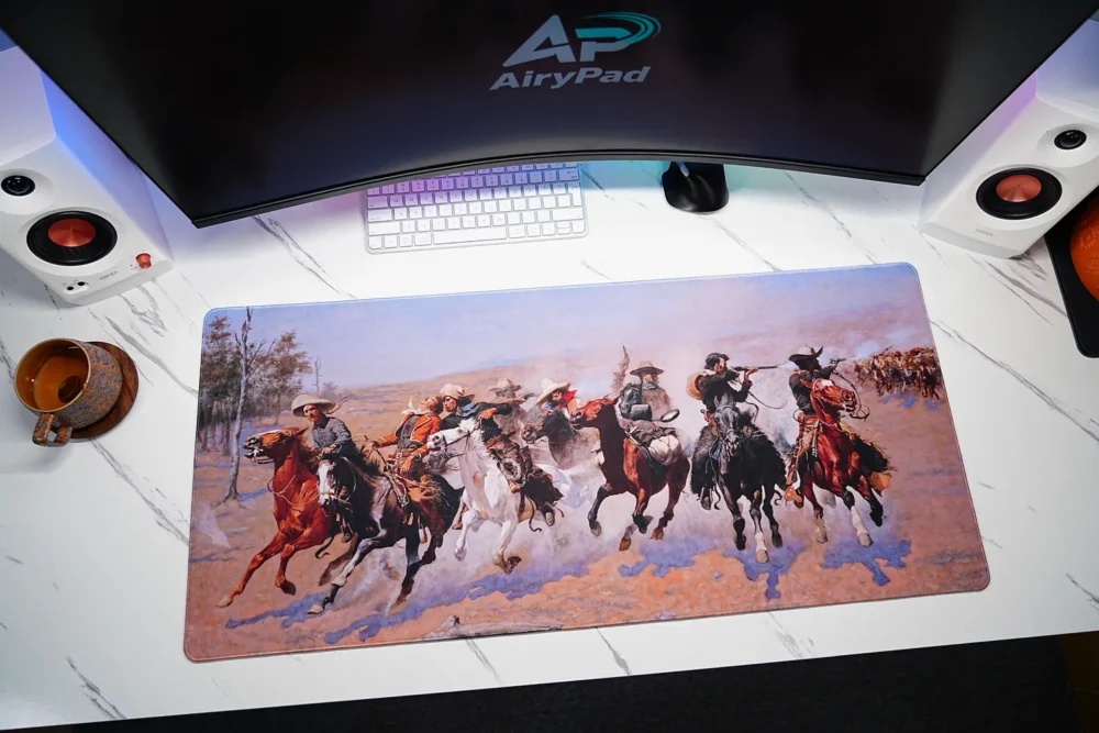 A Dash for the Timber western art desk mat with panoramic cowboy horse-riding artwork