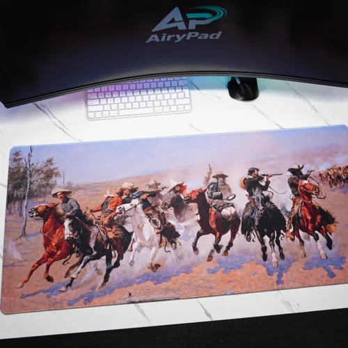 A Dash for the Timber western art desk mat with panoramic cowboy horse-riding artwork